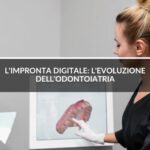 ragazza che guarda impronta digitale-Impronta digitale evoluzione - Studio Dentistico Sante Vassallo